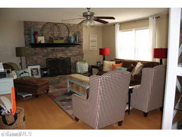 Den/Family/Great Room. Laminate floors and Rock FPlace