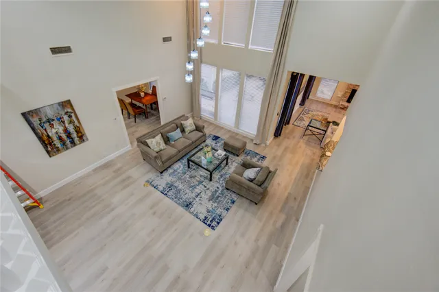 wooden floor in a living room with furniture