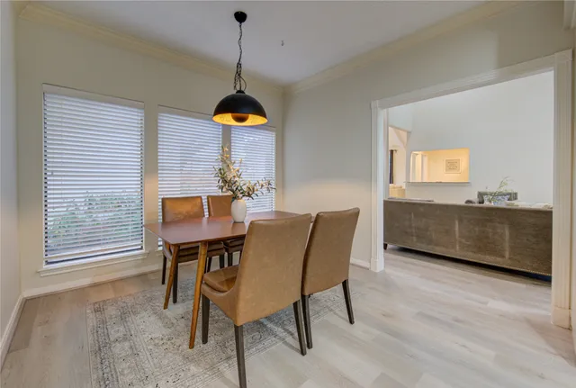 a view of a dining room with furniture