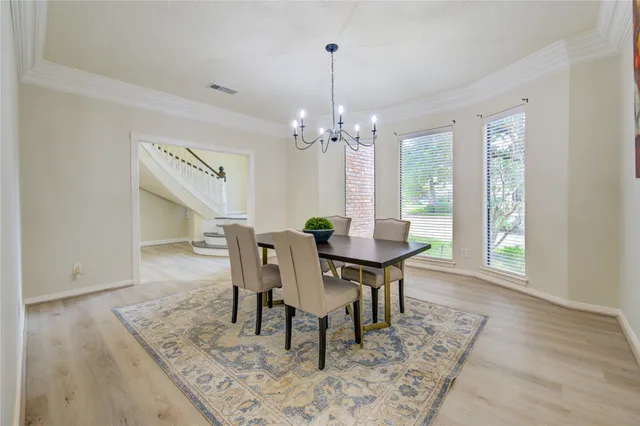a kitchen with granite countertop a sink and a stove top oven