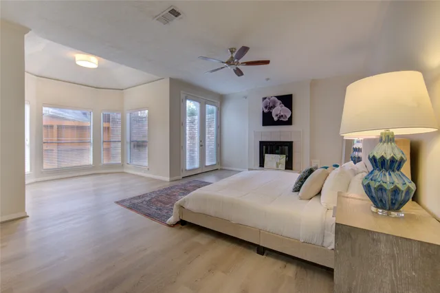 a bathroom with a granite countertop sink mirror and double