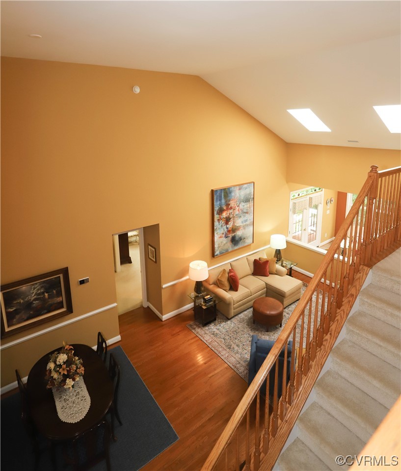 4748 Westhampton Williamsburg, VA 23188 - Photo 16 of 39 a living room with furniture and a wooden floor