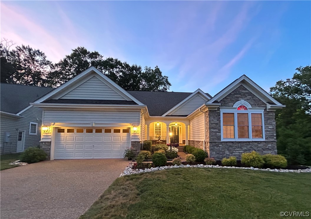 4748 Westhampton Williamsburg, VA 23188 - Photo 2 of 39 a front view of a house with a yard