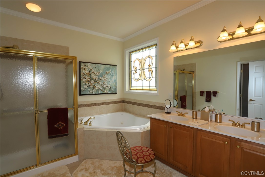 4748 Westhampton Williamsburg, VA 23188 - Photo 25 of 39 a bathroom with a tub sink and mirror