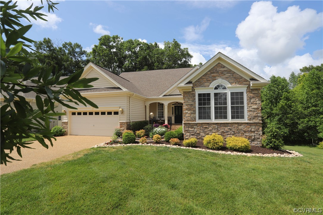 4748 Westhampton Williamsburg, VA 23188 - Photo 5 of 39 a front view of a house with garden