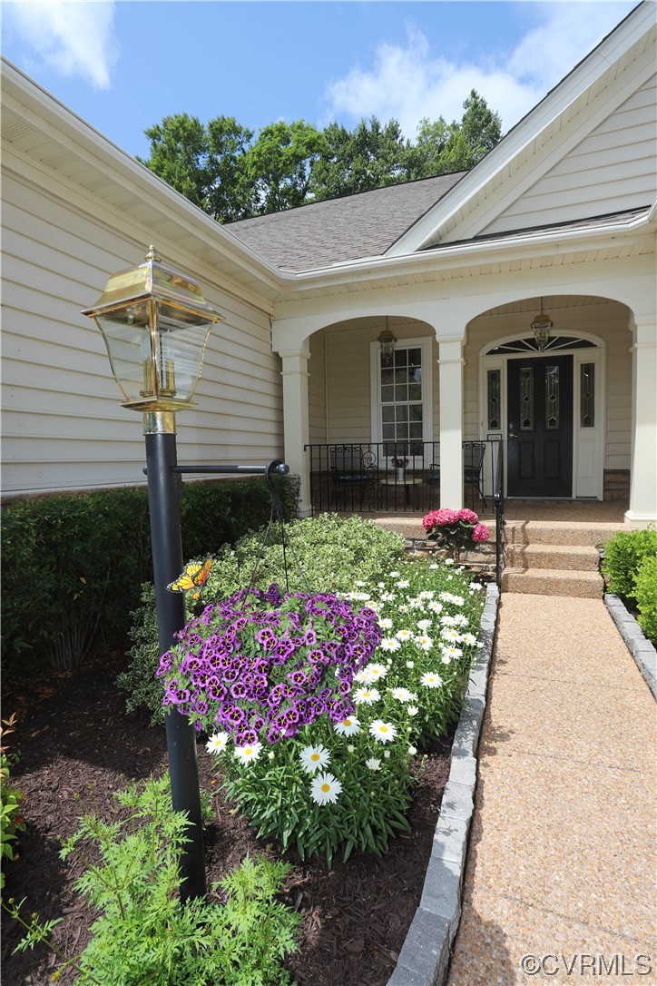 4748 Westhampton Williamsburg, VA 23188 - Photo 6 of 39 a front view of a house with a yard