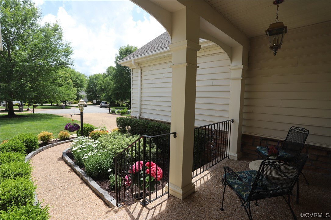 4748 Westhampton Williamsburg, VA 23188 - Photo 7 of 39 a view of a backyard with sitting area and garden