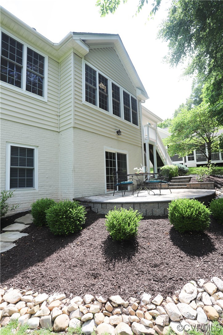 4748 Westhampton Williamsburg, VA 23188 - Photo 8 of 39 a front view of a house with garden