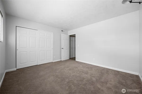 a view of a bathroom with a glass door