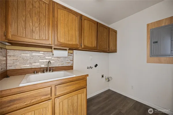 a view of a hallway with stairs