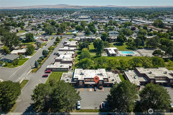 an aerial view of a city with lots of residential buildings