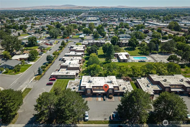 an aerial view of a city with lots of residential buildings
