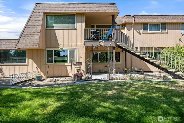 a view of a park with large trees
