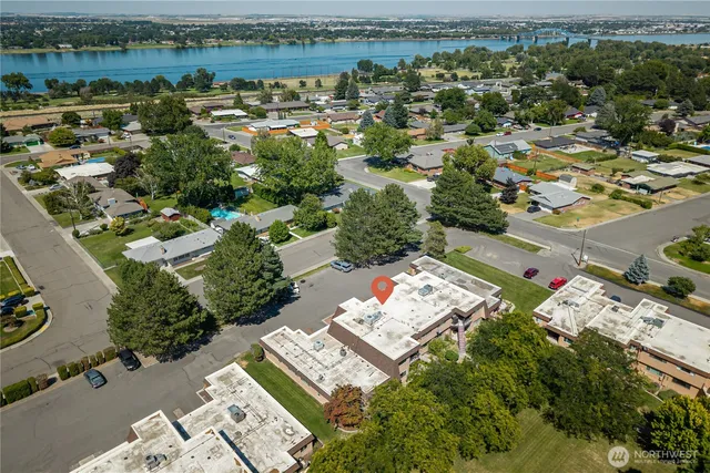 an aerial view of a city with lots of residential buildings