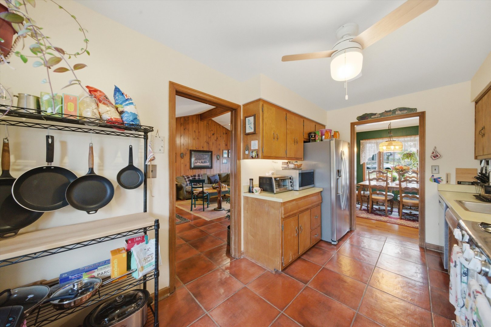 330 Ferndale Avenue Elmhurst, IL 60126 - Photo 11 of 36 a kitchen with granite countertop a stove a sink and a refrigerator