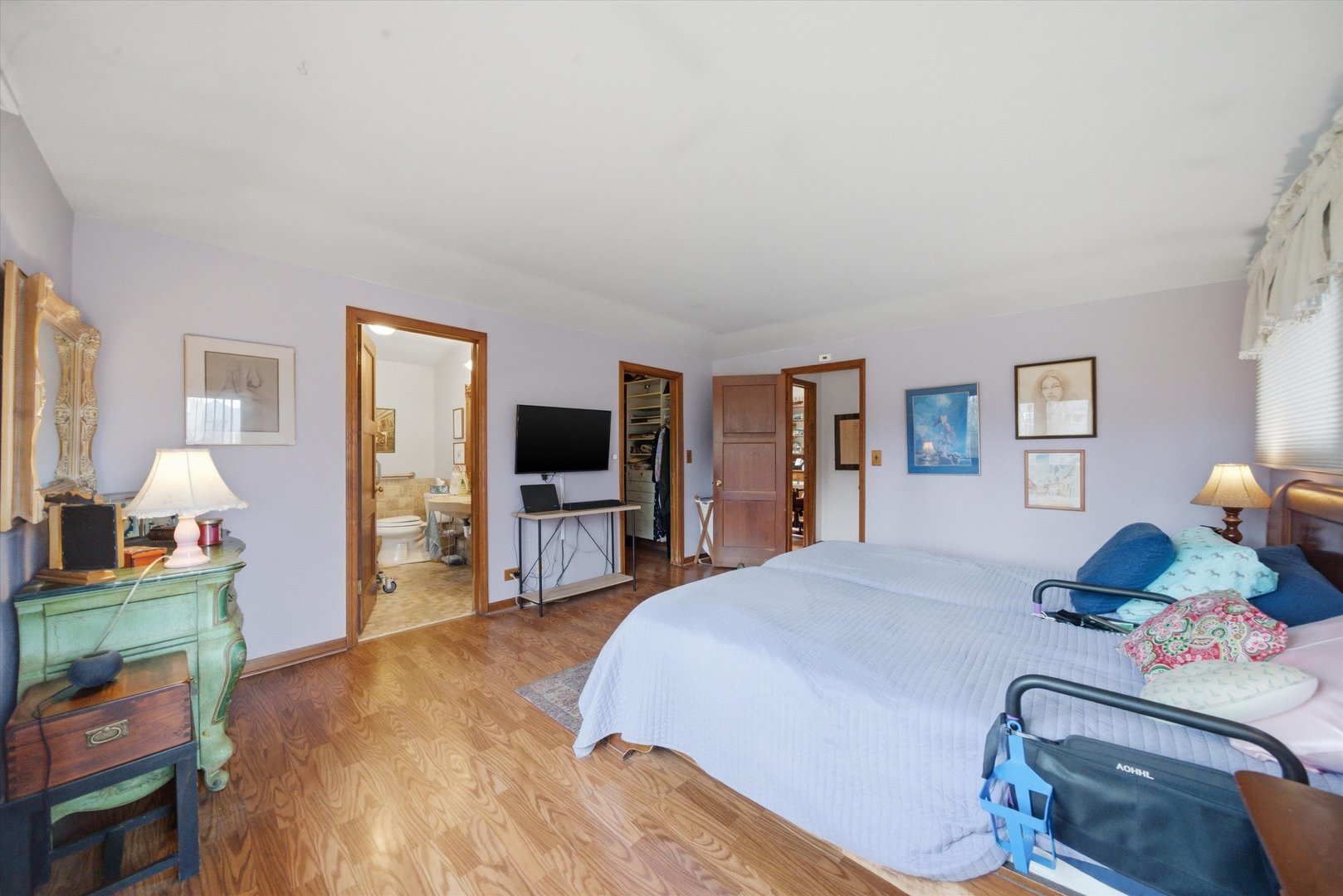 330 Ferndale Avenue Elmhurst, IL 60126 - Photo 14 of 36 a bedroom with a bed and flat tv screen on the dresser