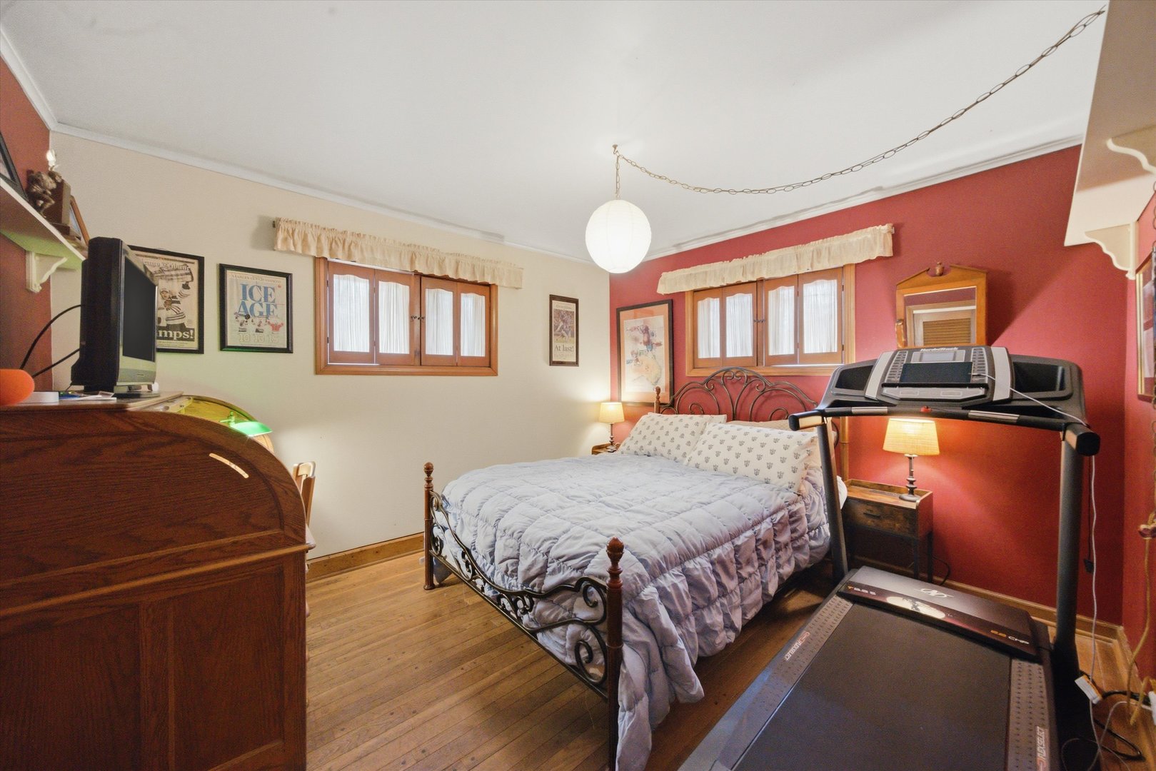 330 Ferndale Avenue Elmhurst, IL 60126 - Photo 18 of 36 a bedroom with a bed and a chandelier