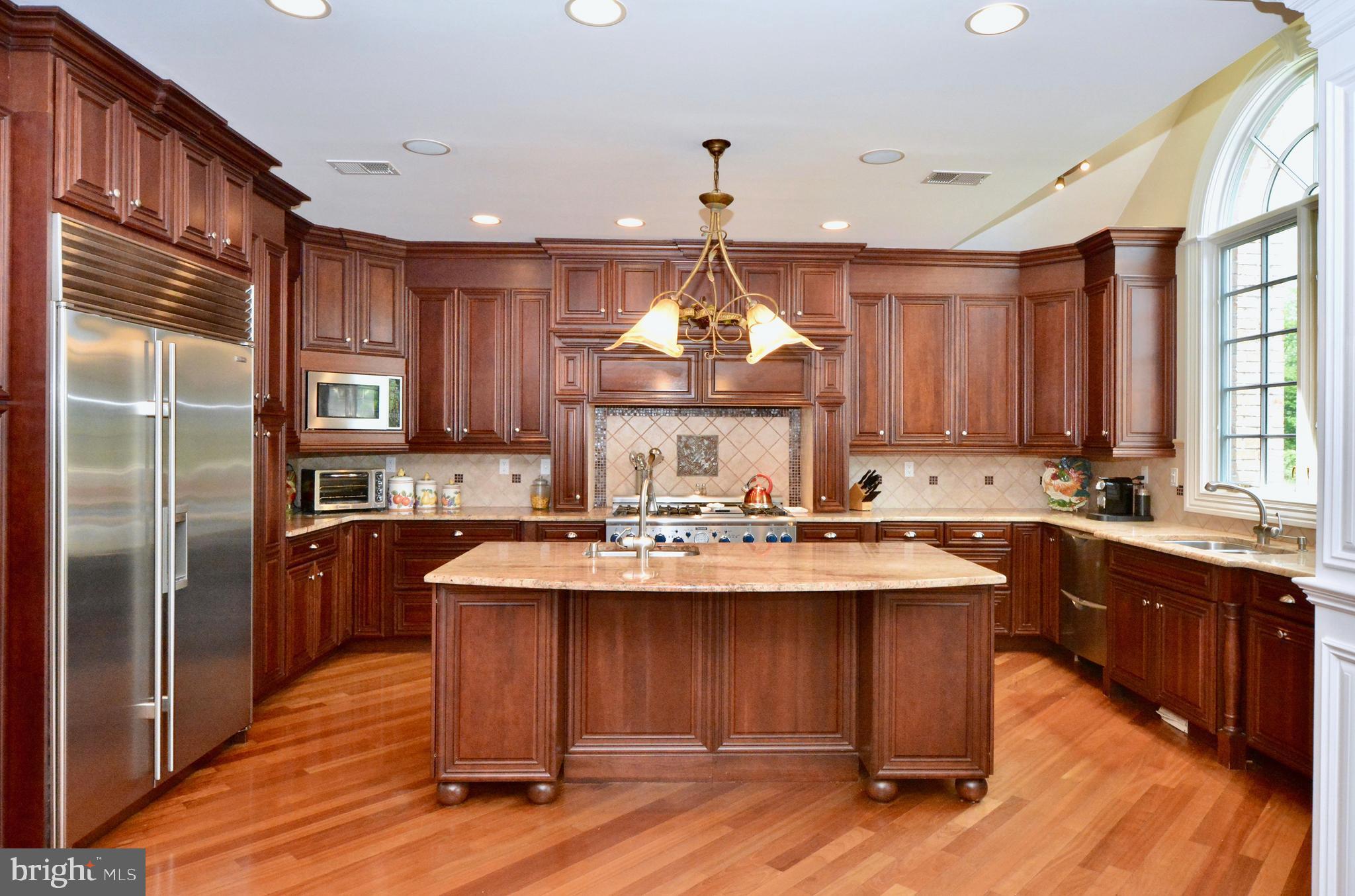8 Silvers Court Pennington, NJ 08534 - Photo 11 of 43 Center island in kitchen with breakfast bar.