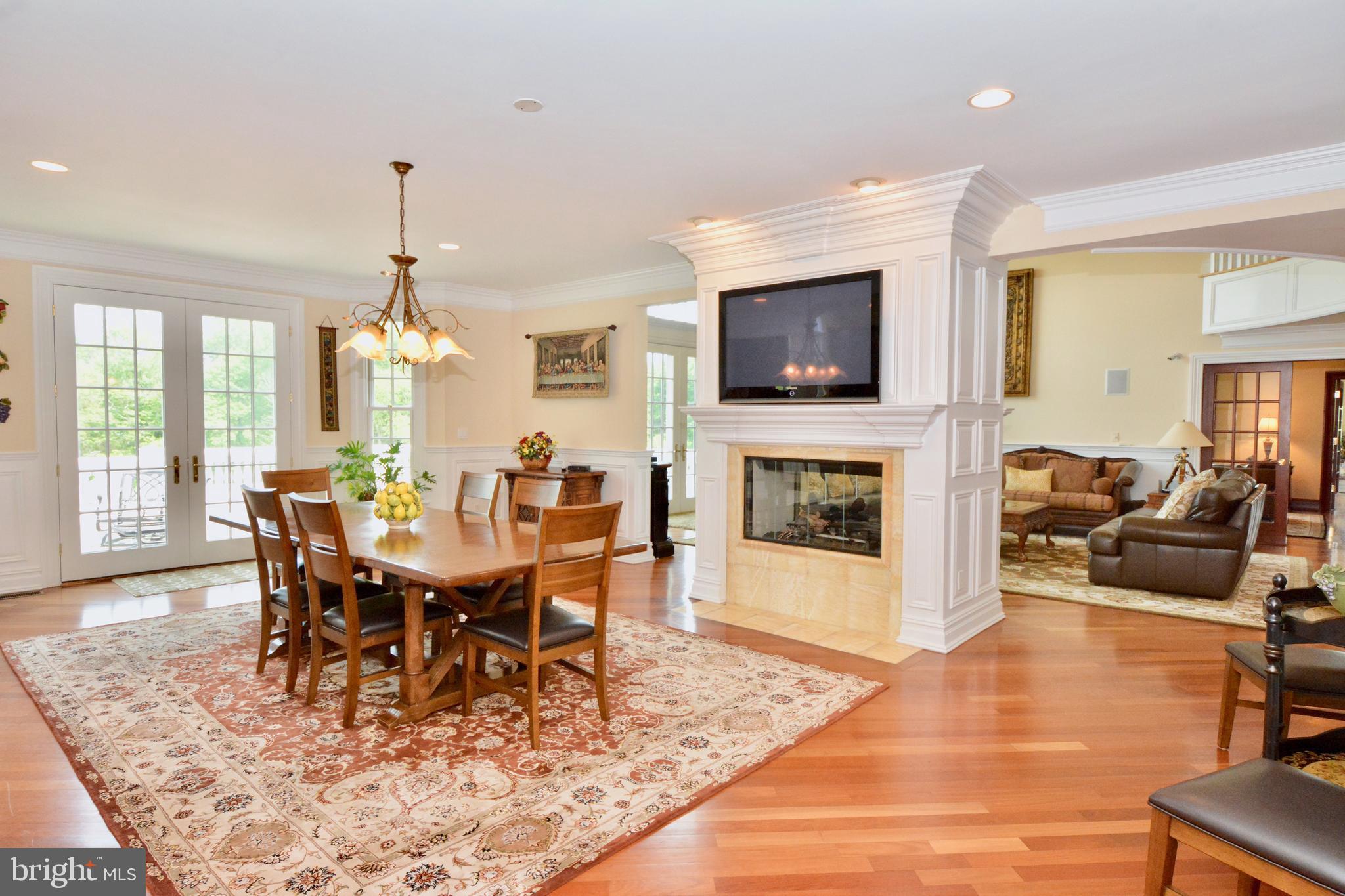 8 Silvers Court Pennington, NJ 08534 - Photo 12 of 43 Dual fireplace in breakfast room and family room.