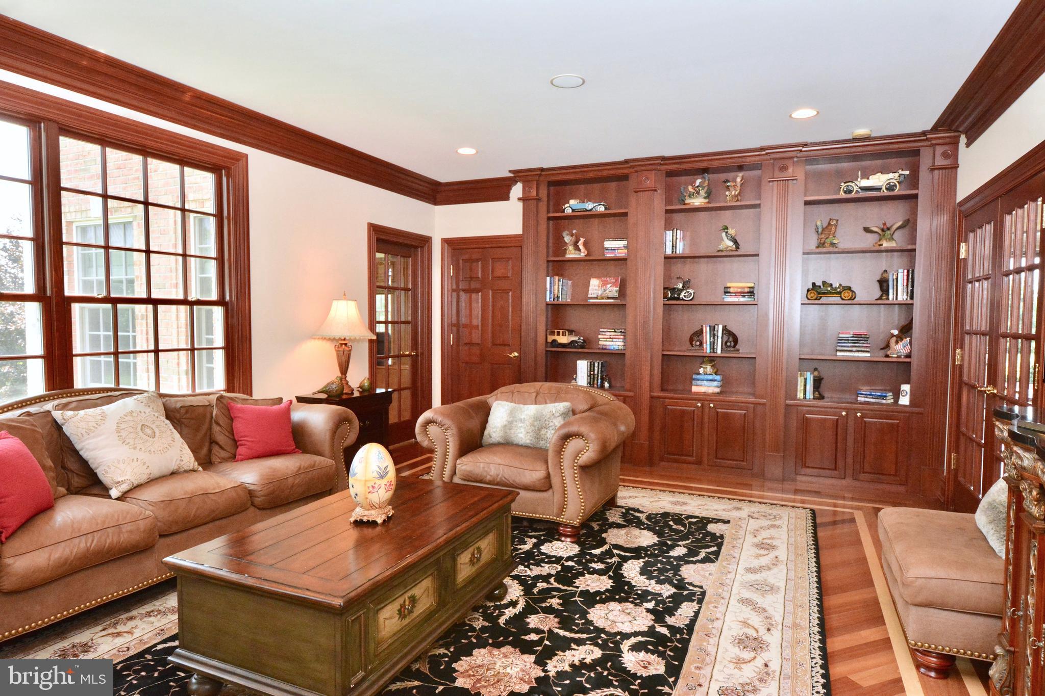 8 Silvers Court Pennington, NJ 08534 - Photo 16 of 43 Custom built-ins on back wall of den.