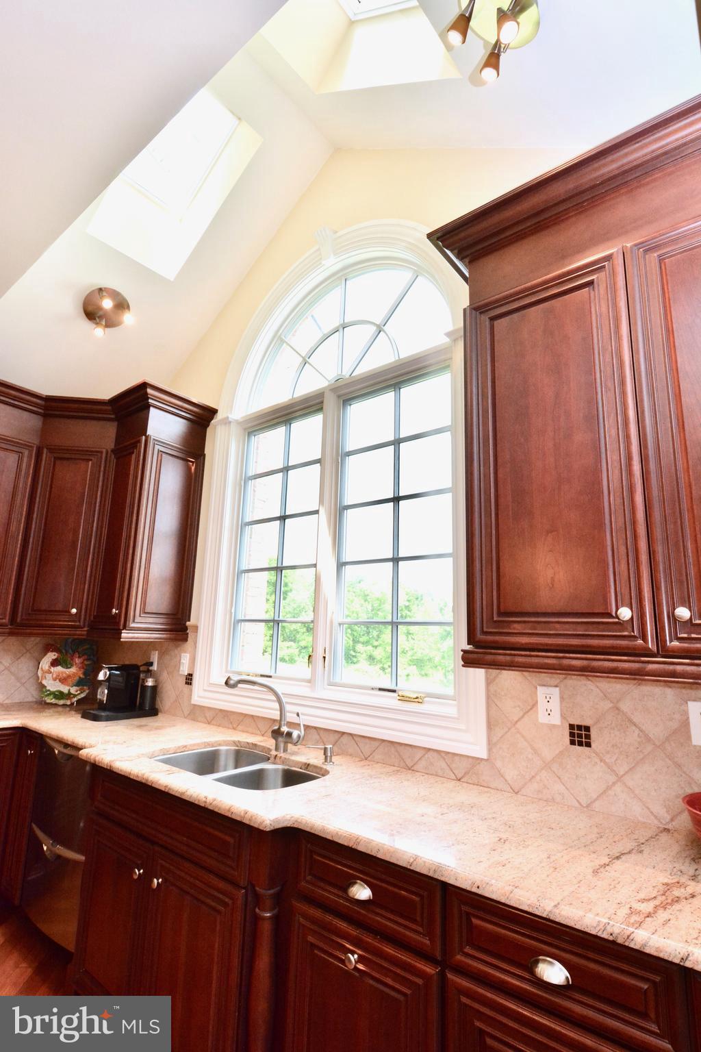 8 Silvers Court Pennington, NJ 08534 - Photo 19 of 43 Kitchen sink with vaulted ceiling & dual skylights