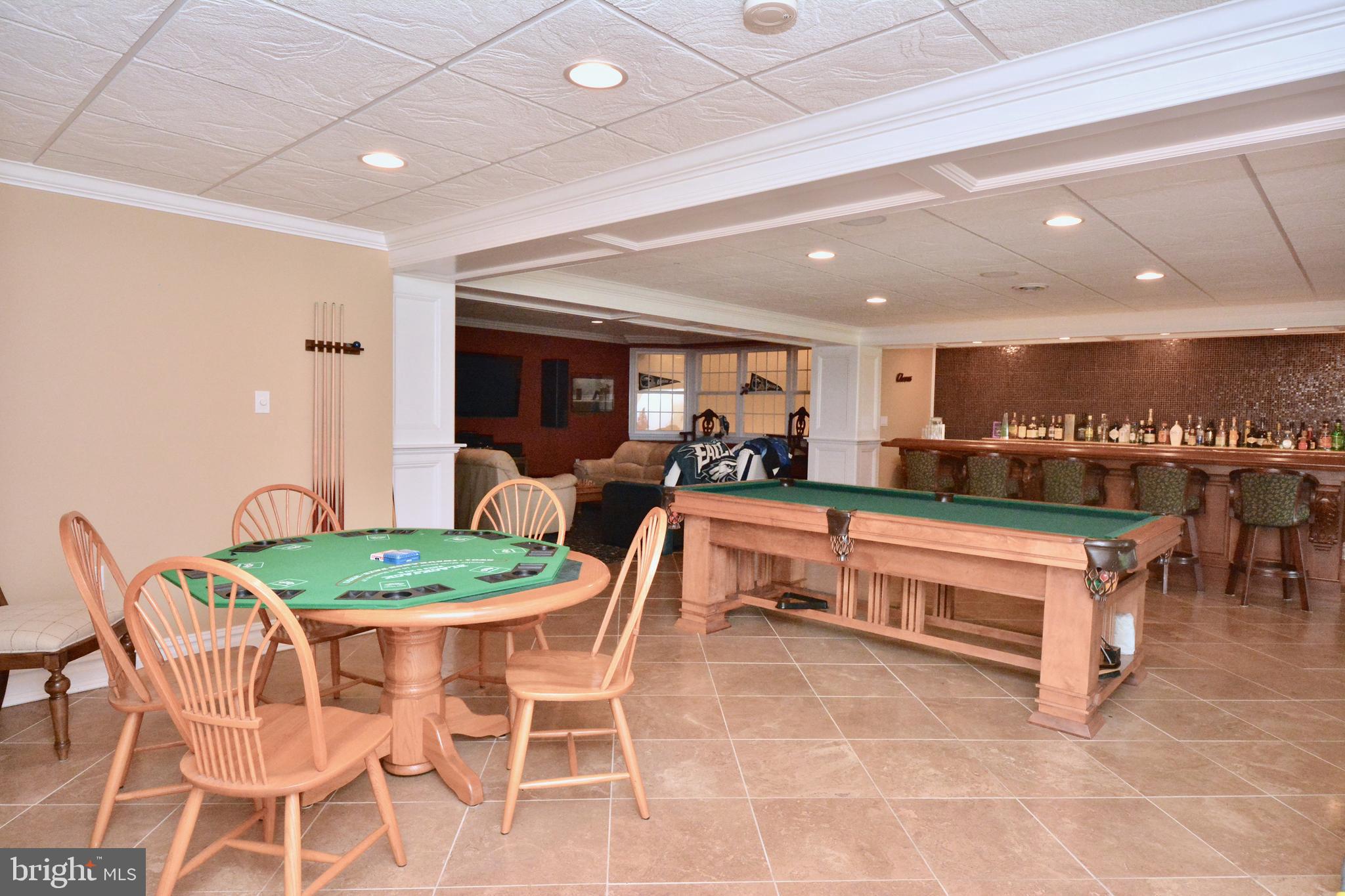 8 Silvers Court Pennington, NJ 08534 - Photo 36 of 43 Game room area of finished basement.
