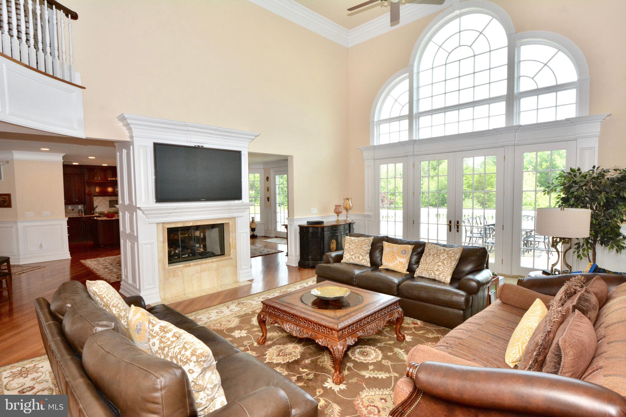 8 Silvers Court Pennington, NJ 08534 - Photo 5 of 43 Two story family room with fireplacee.