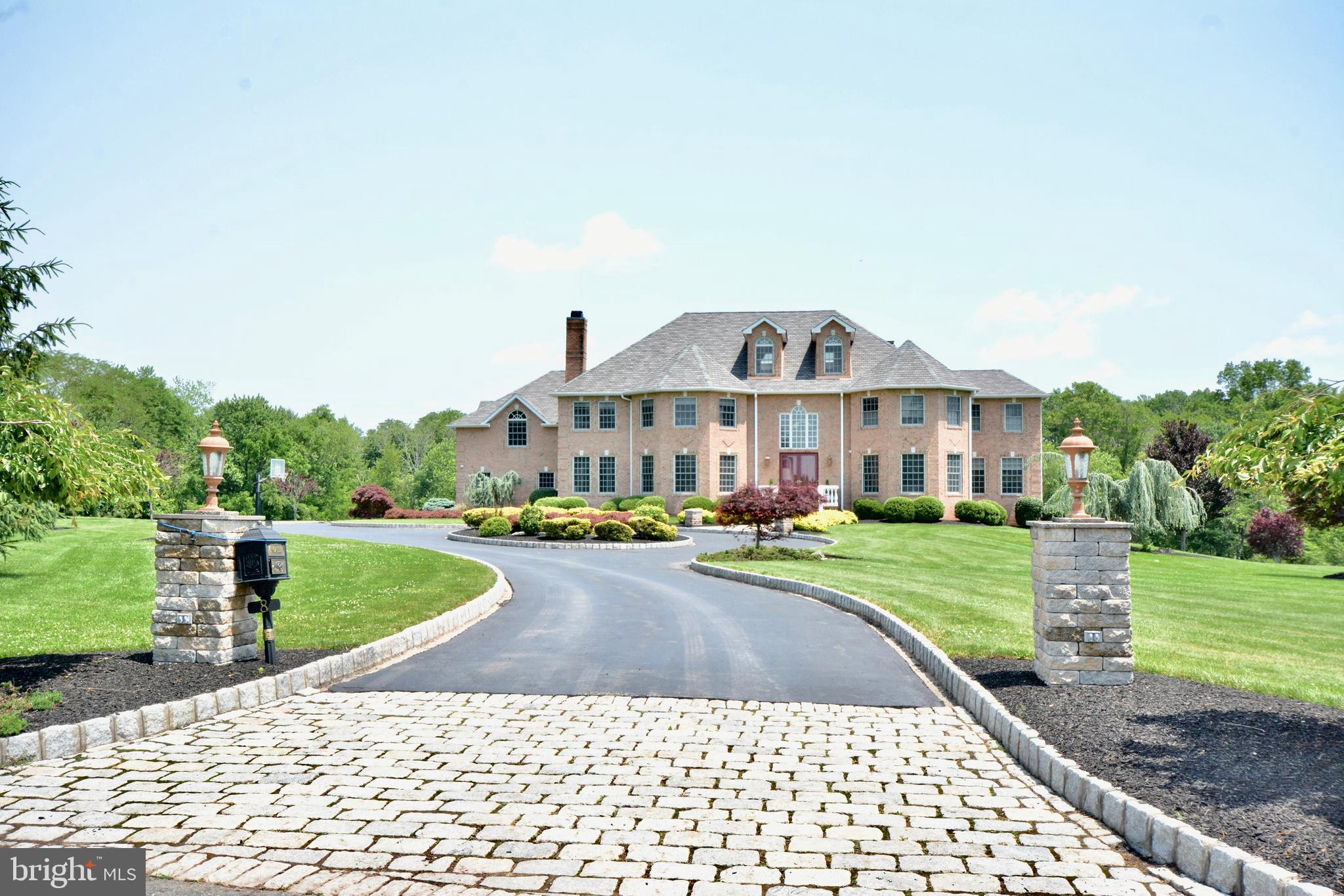 8 Silvers Court Pennington, NJ 08534 - Photo 10 of 43 Stone pillar with post lighting for driveway entry