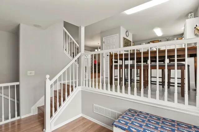 a view of entryway with wooden floor