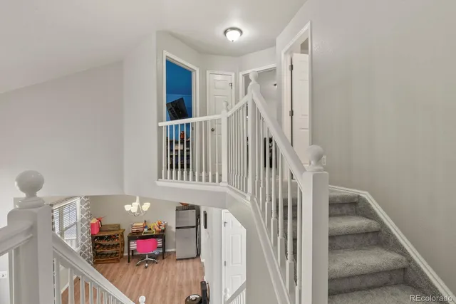 a view of entryway with wooden floor