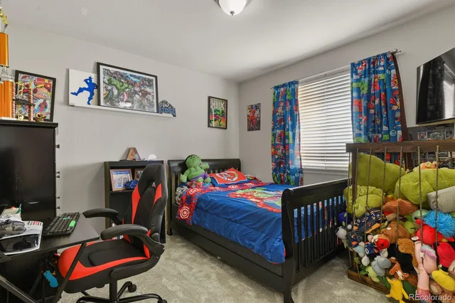 a bedroom with furniture and a bed