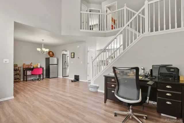 a view of livingroom with furniture and stairs