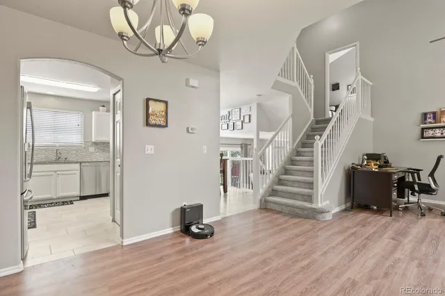 a view of entryway with wooden floor