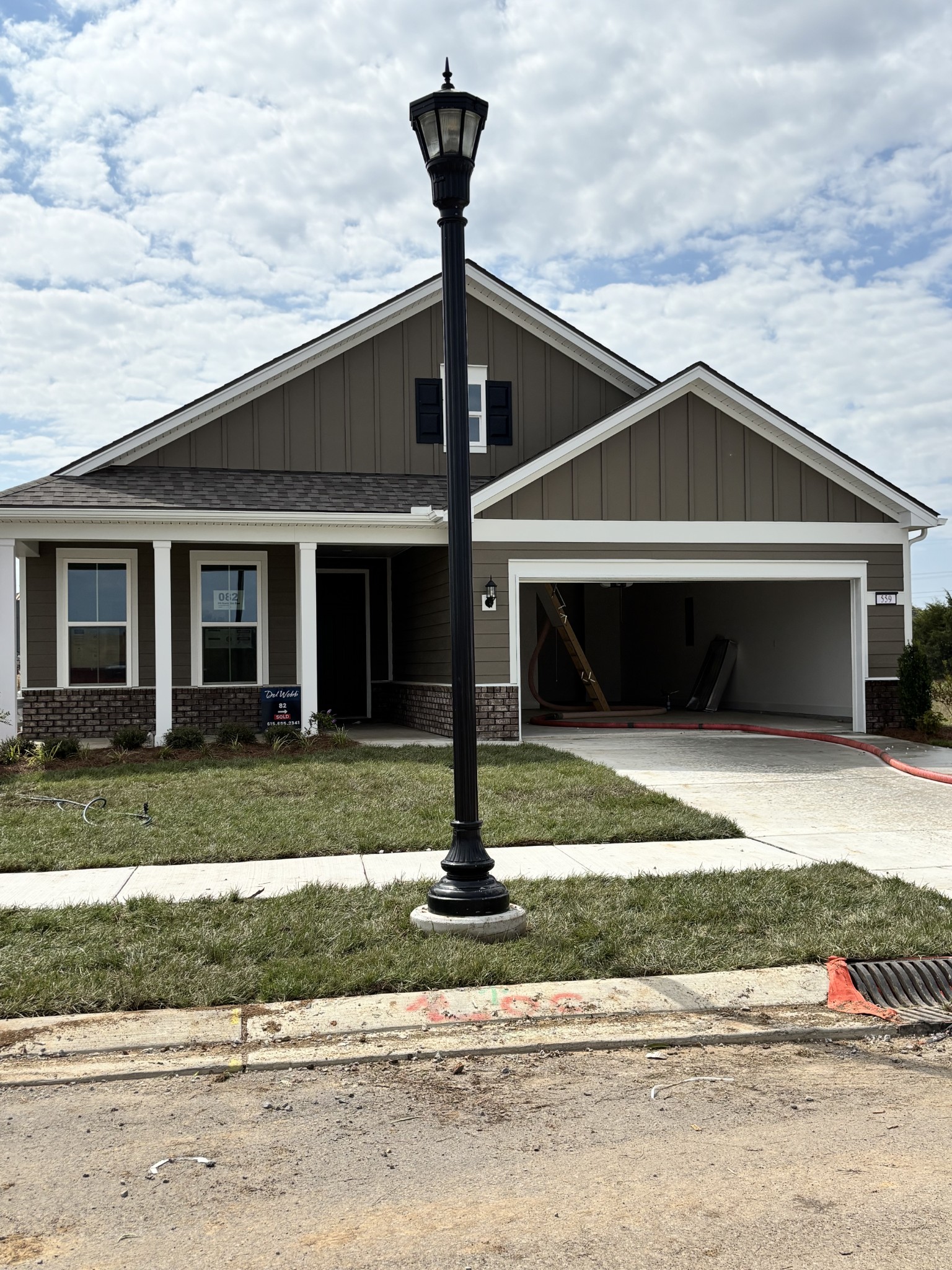 559 Scarlet Oak Road Lebanon, TN 37090 - Photo 1 of 1 a front view of a house with a yard and garage