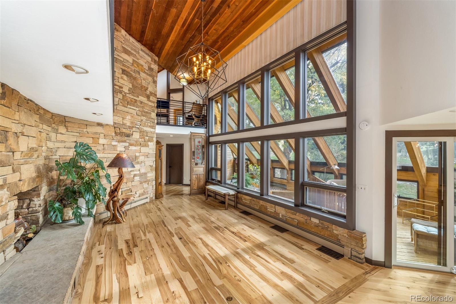 6 Blue Grouse Ridge Road Littleton, CO 80127 - Photo 11 of 50 a view of a house with a porch