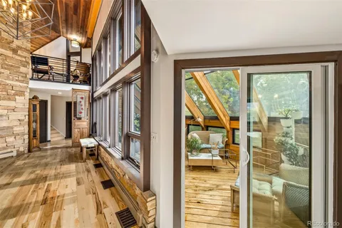 a view of a balcony with furniture