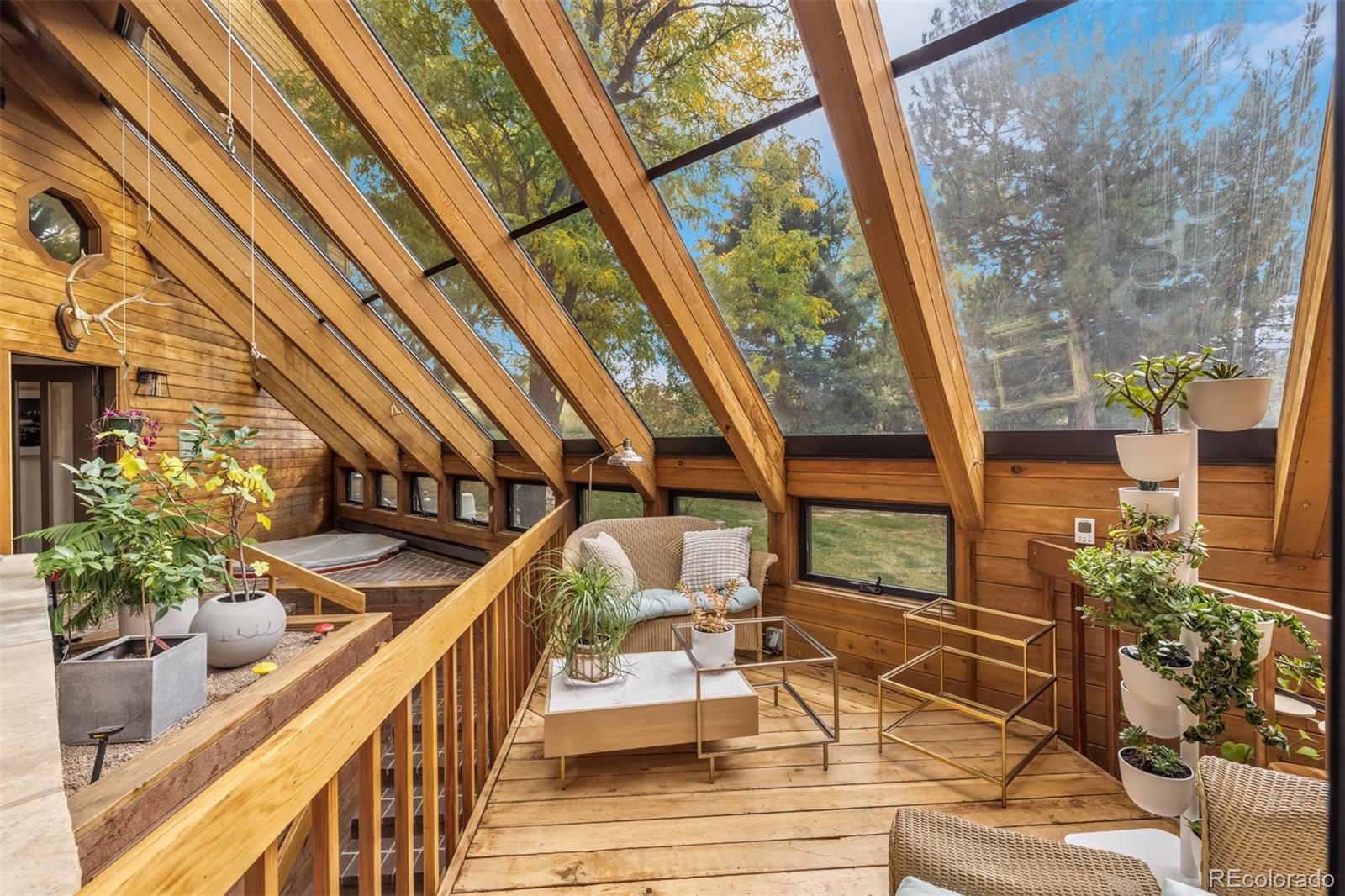 6 Blue Grouse Ridge Road Littleton, CO 80127 - Photo 19 of 50 a view of a balcony with furniture