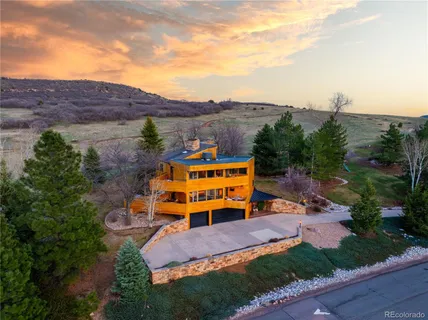 an aerial view of a house with a garden