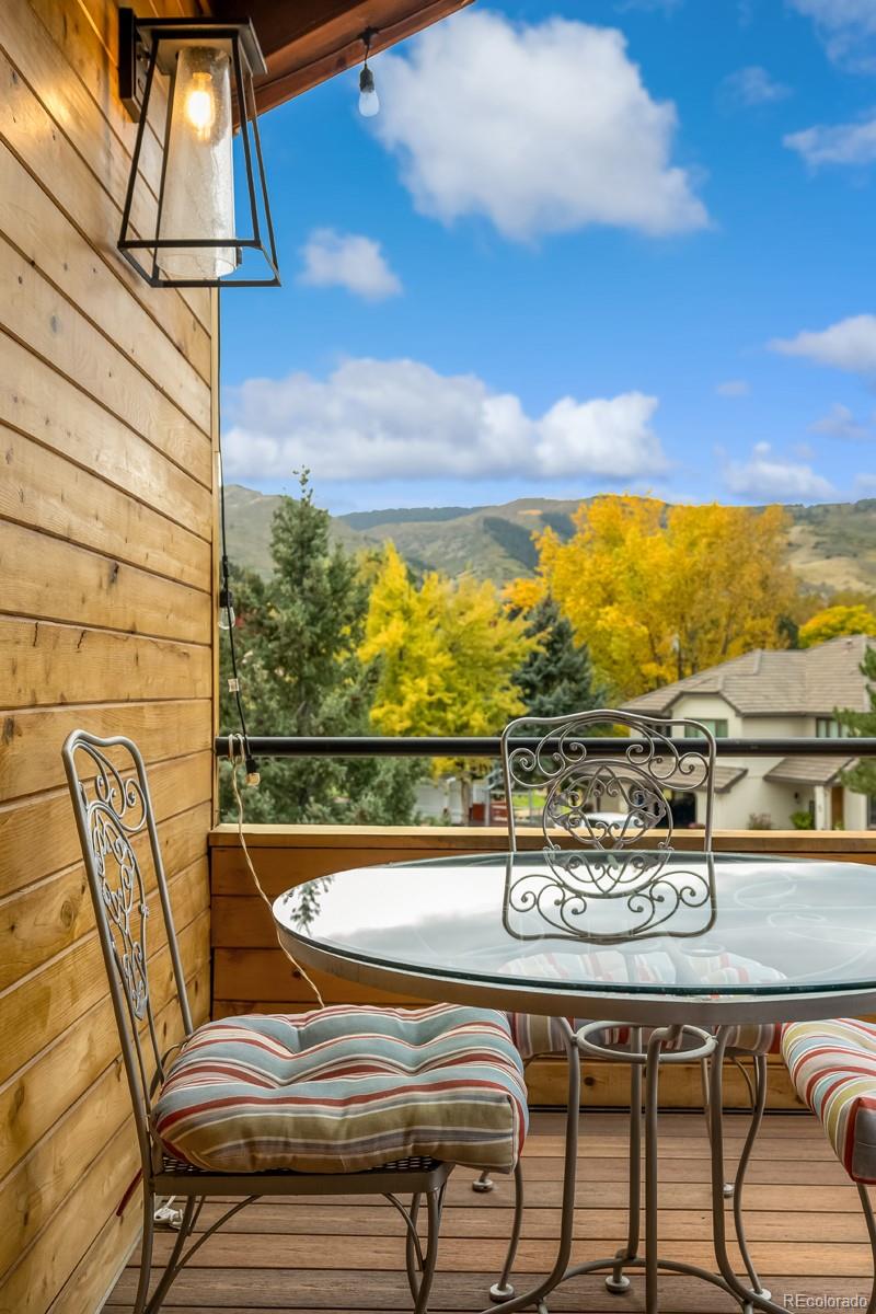 6 Blue Grouse Ridge Road Littleton, CO 80127 - Photo 25 of 50 a view of a swimming pool with furniture