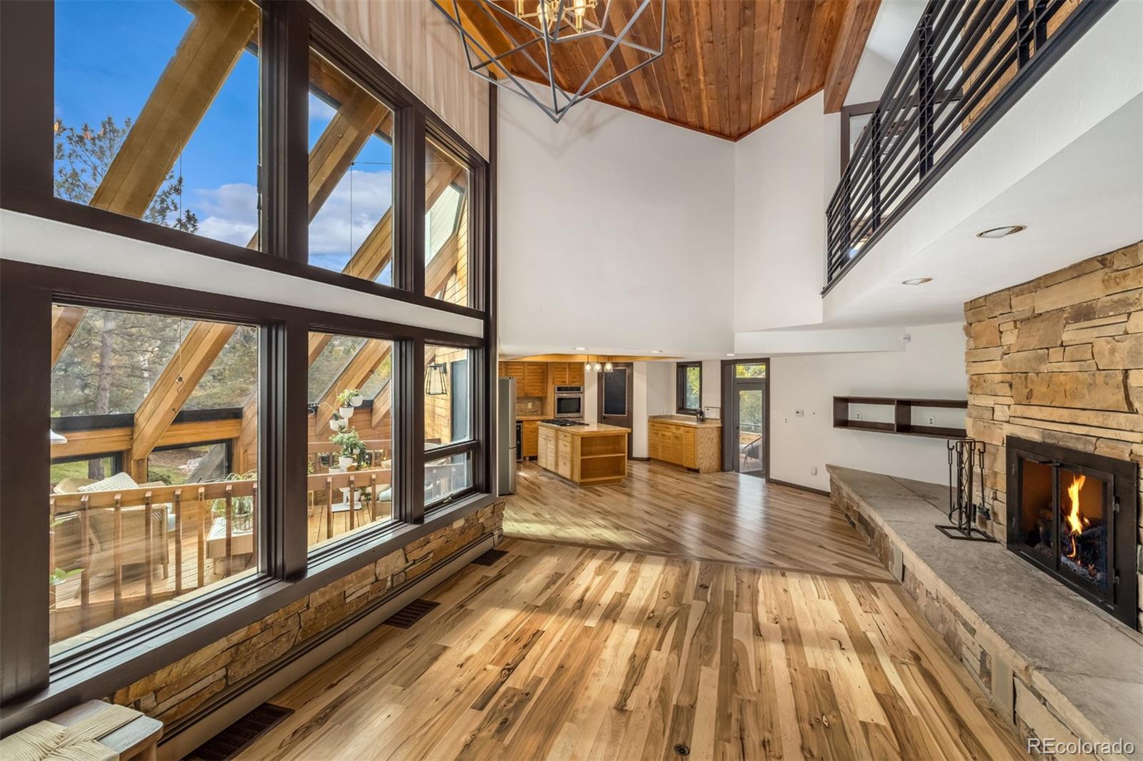 6 Blue Grouse Ridge Road Littleton, CO 80127 - Photo 6 of 50 a view of a living room with a large window