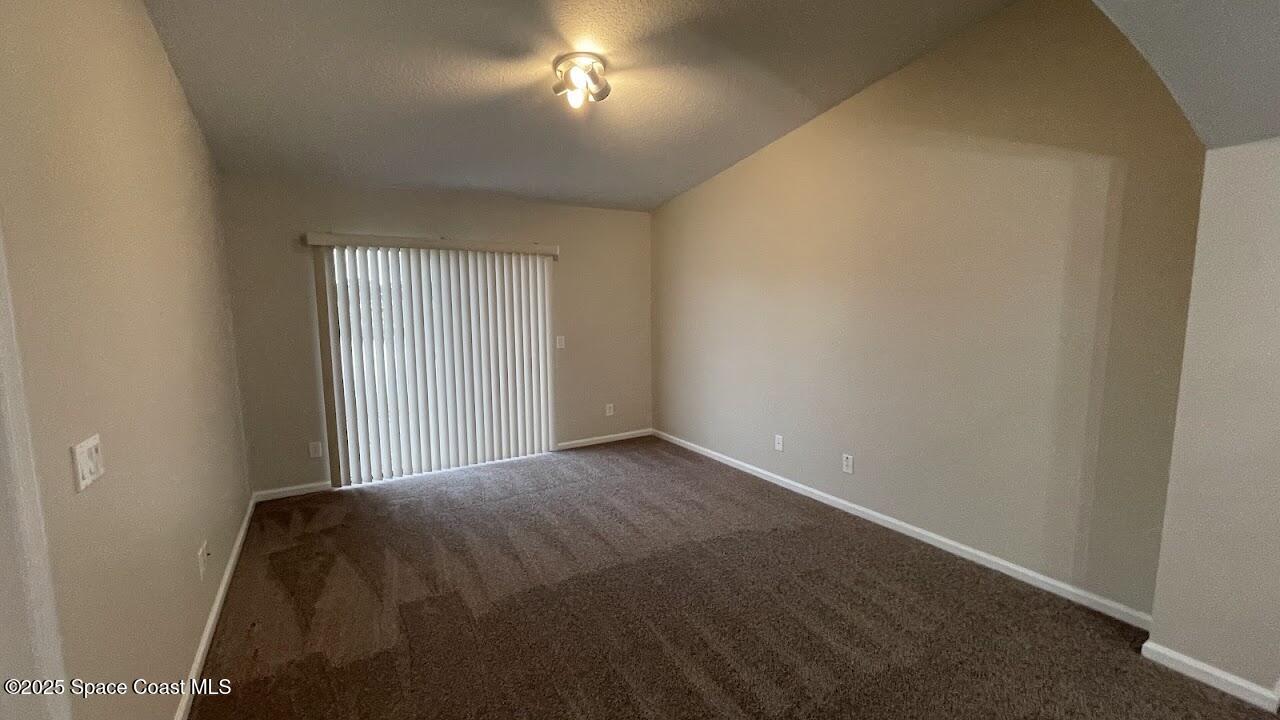 975 Luminary Circle, Unit 103 Melbourne, FL 32901 - Photo 19 of 70 a view of a room that has a window in it