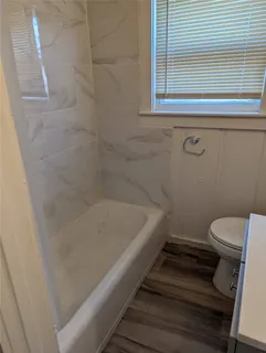 a bathroom with a sink and a toilet