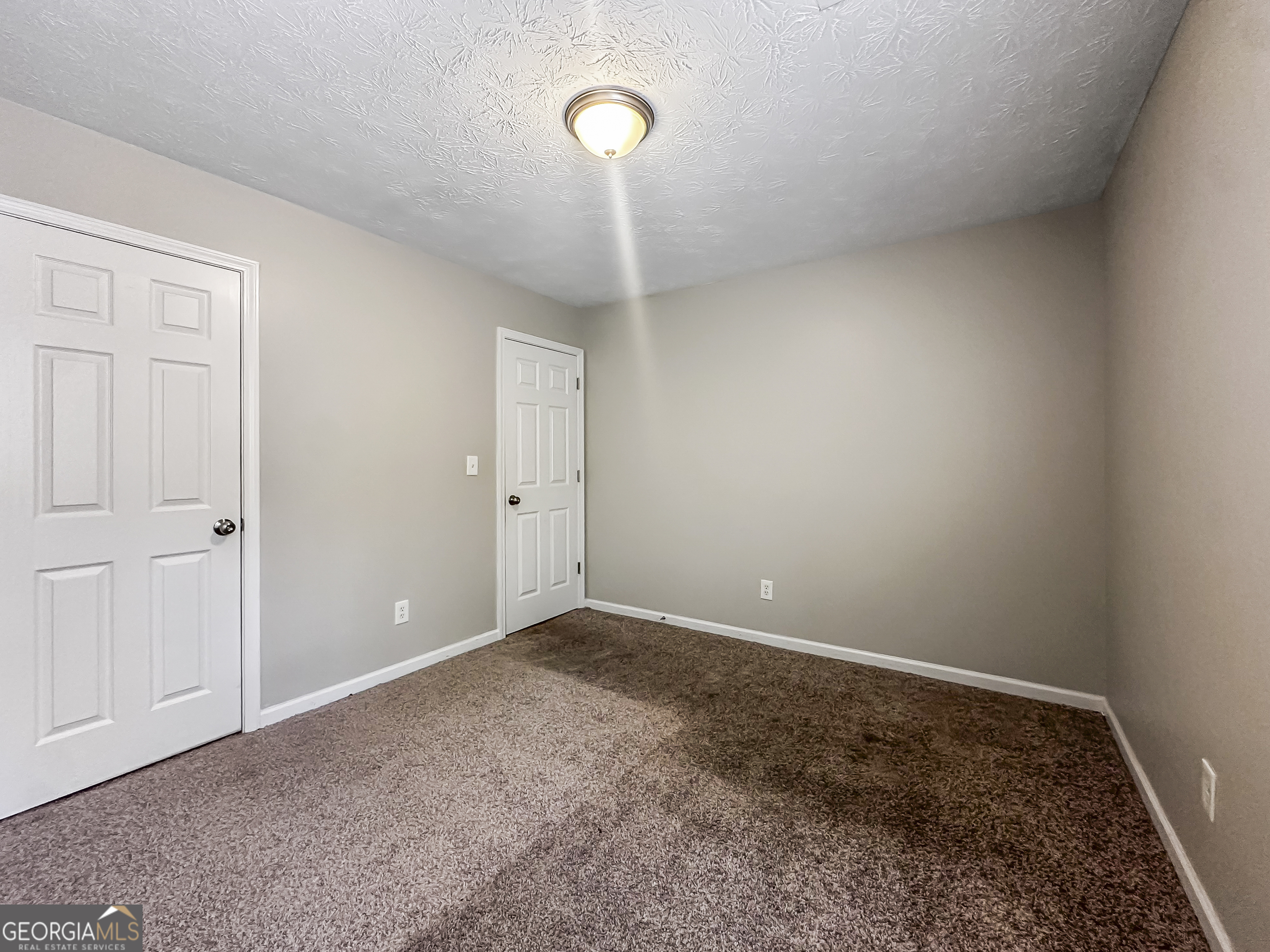 1395 Stephens Pond View Loganville, GA 30052 - Photo 14 of 20 a view of an empty room