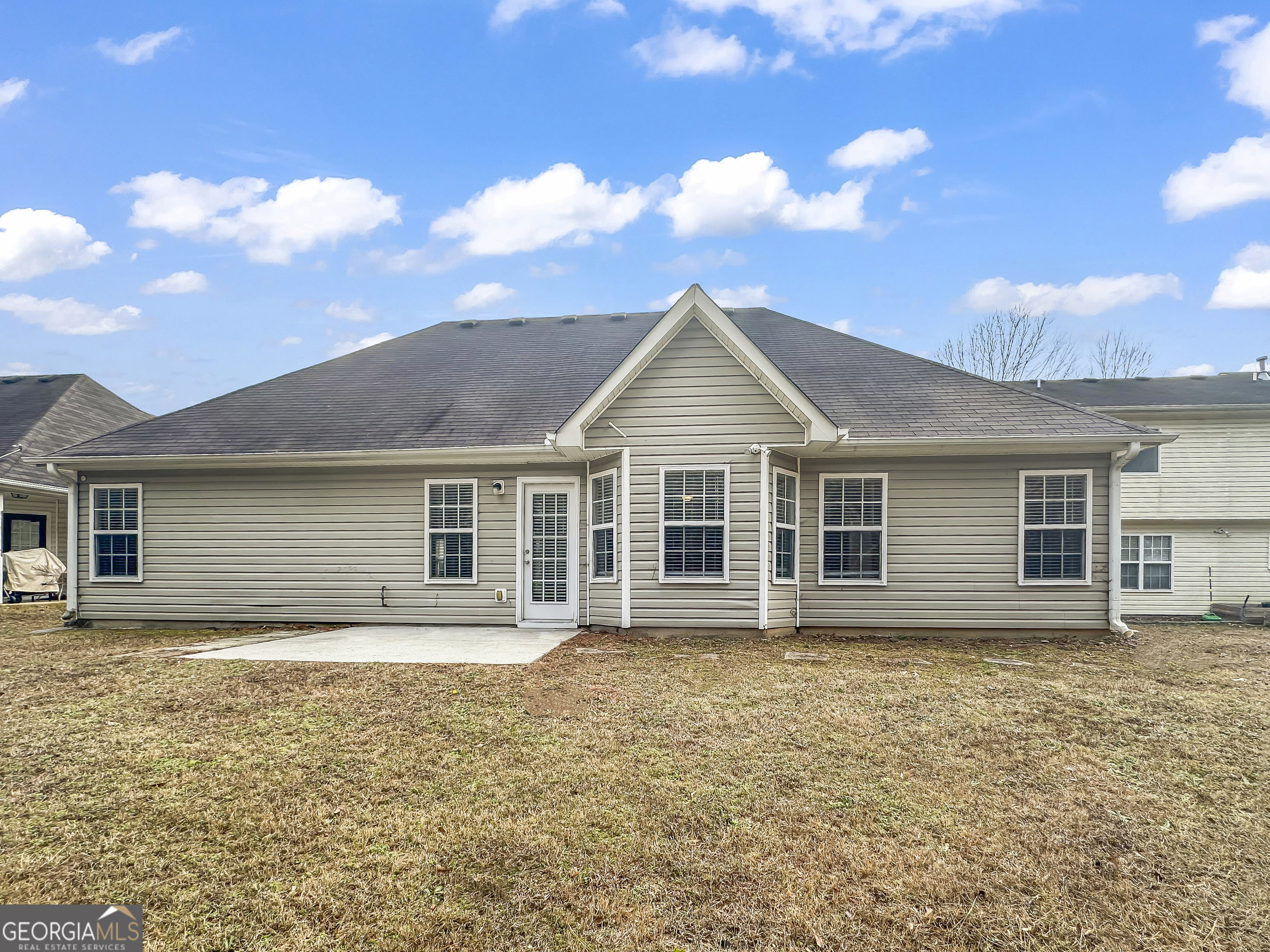 1395 Stephens Pond View Loganville, GA 30052 - Photo 18 of 20 a front view of a house with yard