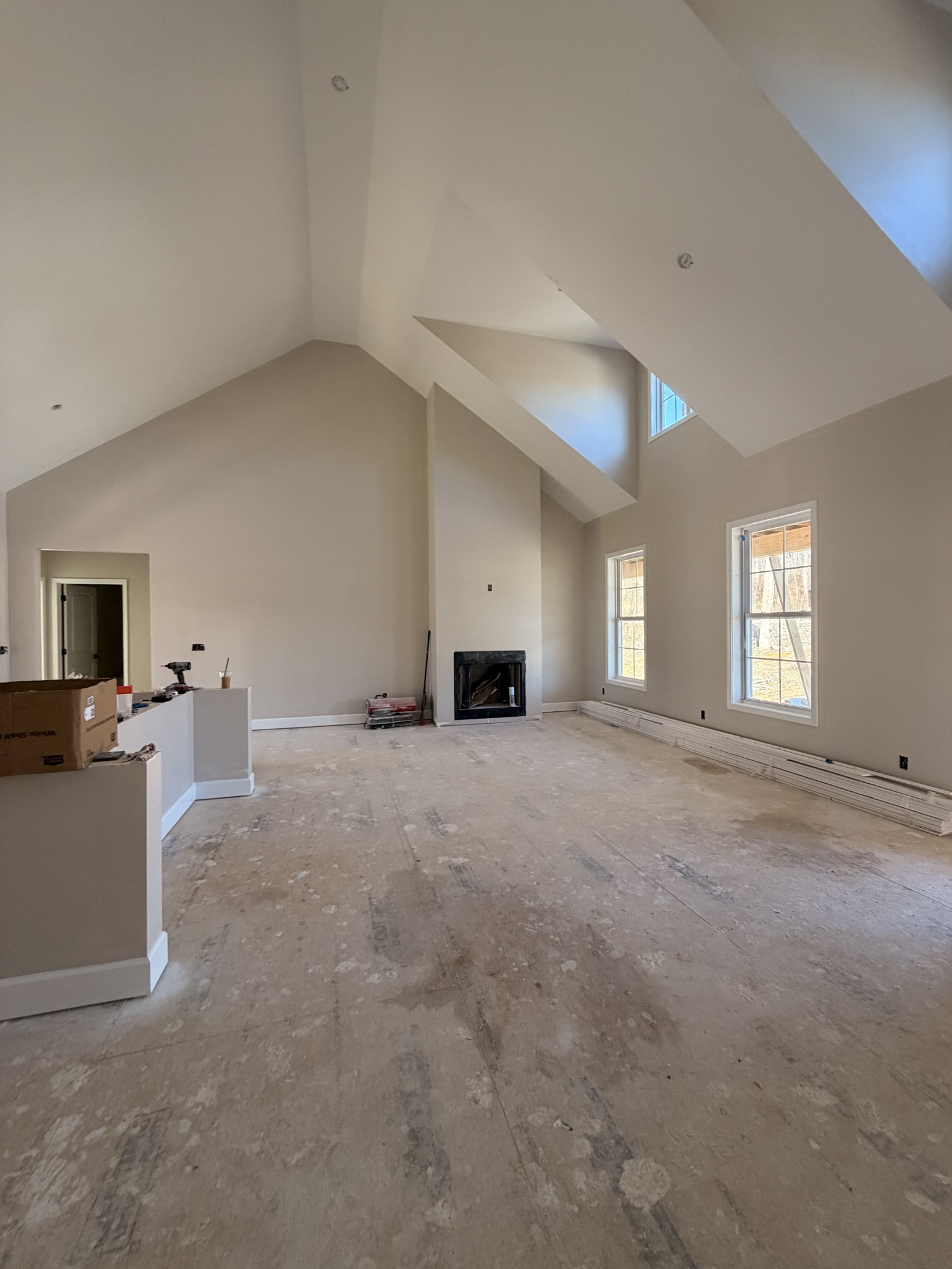 1238 Breeden Road Charlotte, TN 37036 - Photo 2 of 24 a view of a livingroom with a fireplace