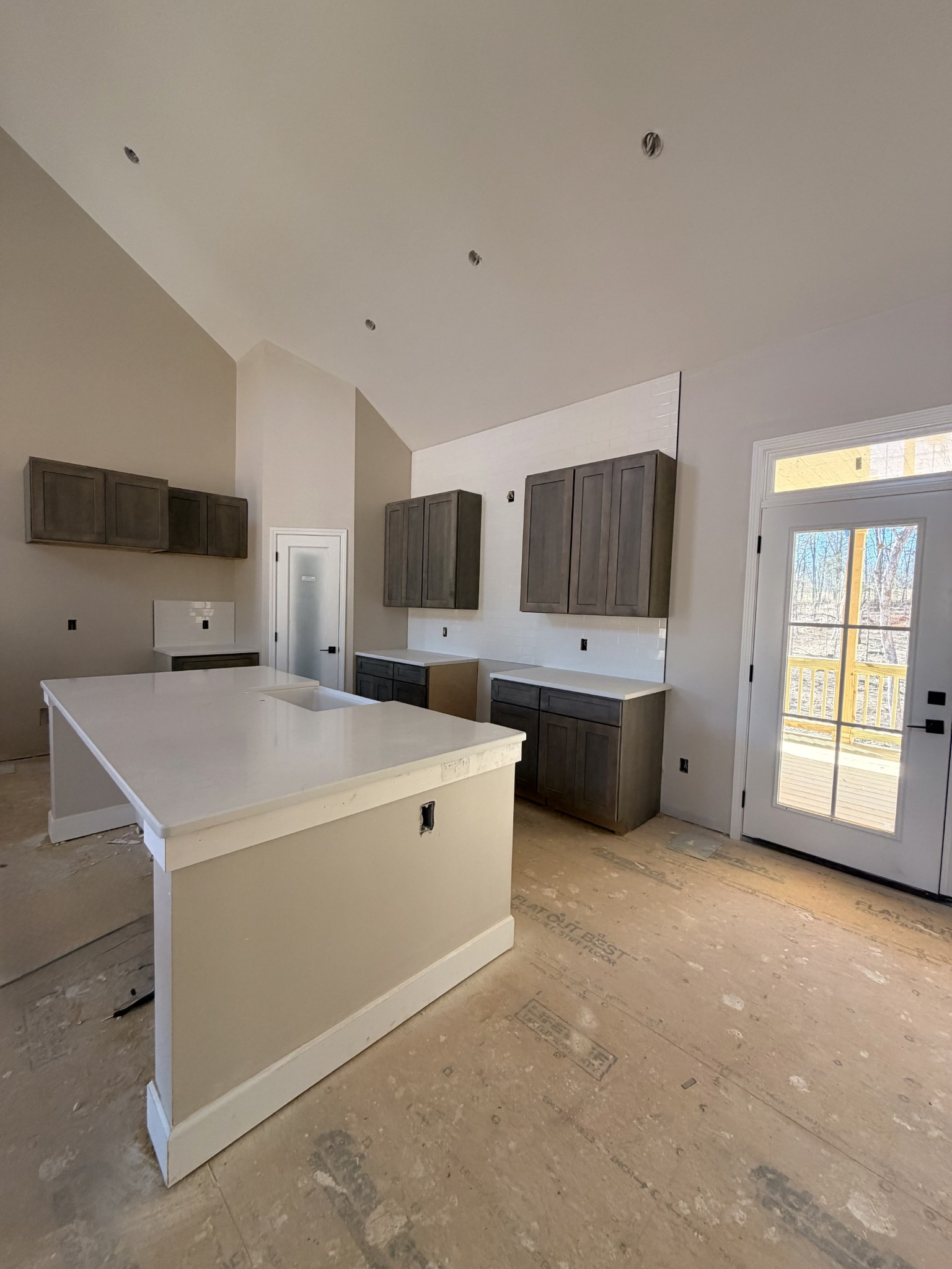 1238 Breeden Road Charlotte, TN 37036 - Photo 6 of 24 a large white kitchen with a large window