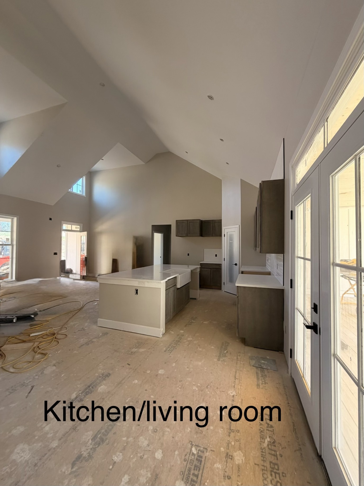 1238 Breeden Road Charlotte, TN 37036 - Photo 7 of 24 a view of a kitchen with kitchen island a counter top space a sink a refrigerator and a window