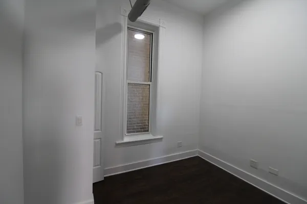 en empty room with windows