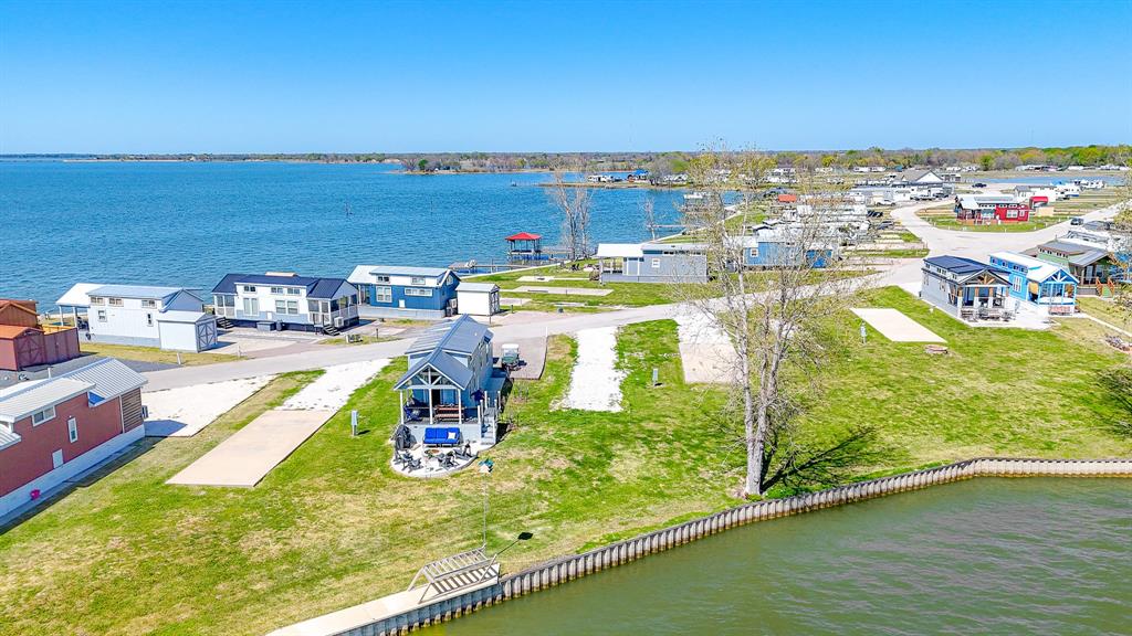 Lot 117 Peninsula Road Kerens, TX 75144 - Photo 13 of 34 swimming pool view with a lake view