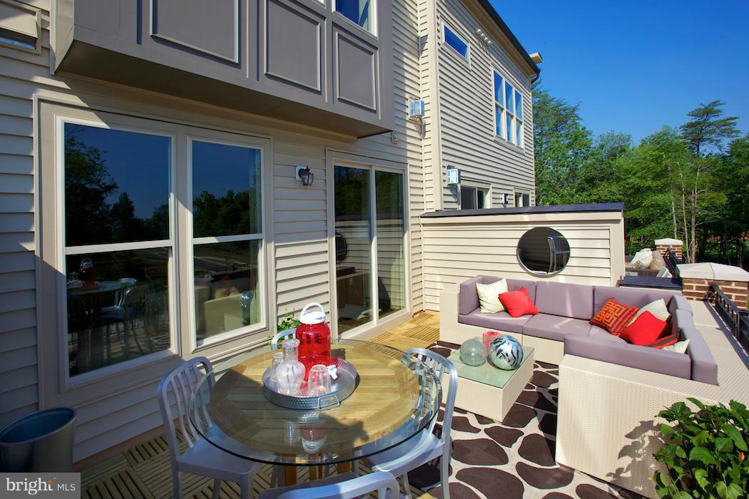 42262 Rhett Drive Ashburn, VA 20148 - Photo 23 of 30 a view of a dining room with furniture and front door